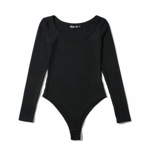 Green and black crew body suits